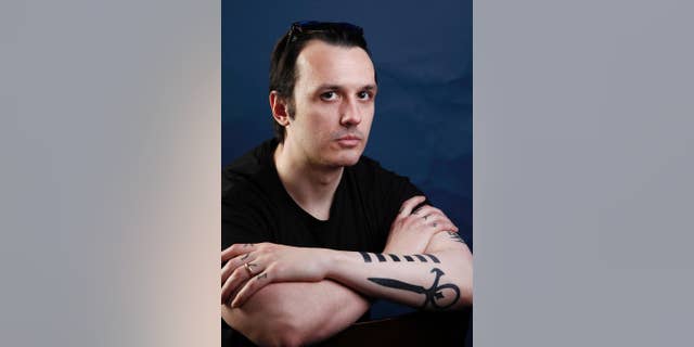 In this Jan. 22, 2012, file photo, documentary subject Damien Echols, from the film "West of Memphis," poses for a portrait in Park City, Utah. Echols spent nearly 18 years on Arkansas' death row before he and two others were freed in 2011 as part of a plea deal. (AP Photo/Carlo Allegri, File)