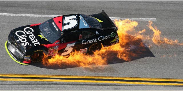 Kasey Kahne (5) moves off the track into Turn 4 during the NASCAR Aaron's 312 Nationwide series auto race at Talladega Superspeedway, Saturday, May 3, 2014, in Talladega, Ala. (AP Photo/Dale Davis)