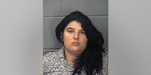 This photo released by the Elkhart, Ind., Police Department shows Amber Pasztor. Pasztor, was arrested on two counts of murder Monday, Sept. 26, 2016, in the deaths of seven-year-old Liliana Hernandez and six-year-old Rene Pasztor, who were the subject of an Amber Alert. (Elkhart Police Department via AP)