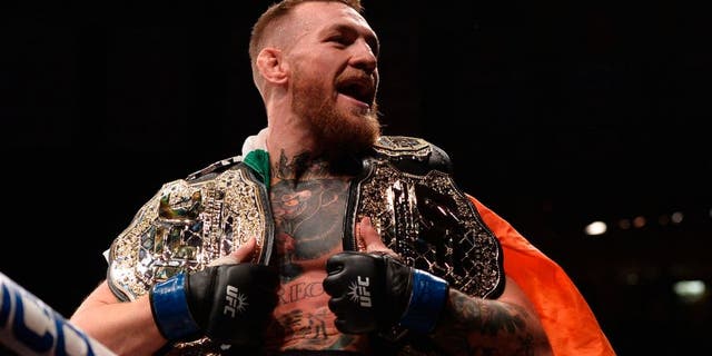 NEW YORK, NY - NOVEMBER 12: Conor McGregor of Ireland celebrates his victory over Eddie Alvarez in their UFC lightweight championship fight during the UFC 205 event at Madison Square Garden on November 12, 2016 in New York City. (Photo by Brandon Magnus/Zuffa LLC/Zuffa LLC via Getty Images)
