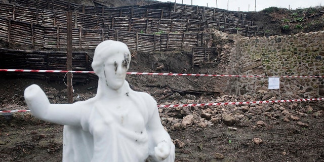 Nov. 30, 2010: A stretch of garden wall ringing an ancient house in Pompeii that gave way after days of torrential rain is cordoned-off. Officials said an inspection found that a 40-foot-long section of wall forming part of the perimeter of a garden area near the House of the Moralist gave way in several points.