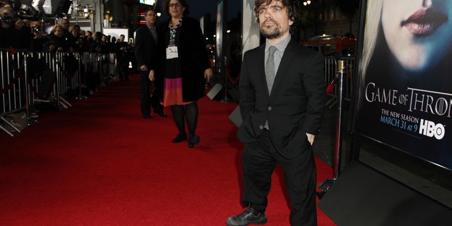 Cast member Peter Dinklage arrives at the premiere for the third season of the HBO television series "Game of Thrones" at the TCL Chinese Theatre on Monday, March 18, 2013 in Los Angeles.
