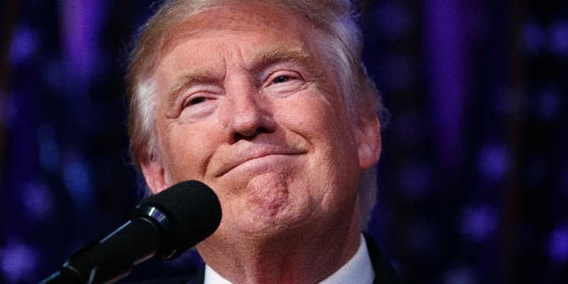 FILE - In this Nov. 9, 2016, file photo, President-elect Donald Trump smiles as he arrives to speak at an election night rally, Wednesday in New York. Donald Trump enters the White House on Jan. 20 just as he entered the race for president: defiant, unfiltered, unbound by tradition and utterly confident in his chosen course. In the 10 weeks since his surprise election as the nation’s 45th president, Trump has violated decades of established diplomatic protocol, sent shockwaves through business boardrooms, tested long-standing ethics rules and continued his combative style of replying to any slight with a personal attack _ on Twitter and in person. (AP Photo/ Evan Vucci, File)