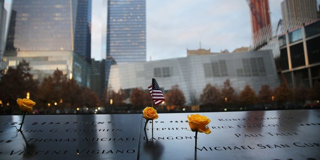 NEW YORK, NY - NOVEMBER 11: Flowers are viewed at the 9/11 Memorial where flowers are placed on the names of veterans killed on September 11, 2001 for Veterans Day in New York on November 11, 2014 in New York City. New York celebrated the day with the annual Veteran's Day Parade, which is often called the largest Veteran's Day Parade in the country. (Photo by Spencer Platt/Getty Images)