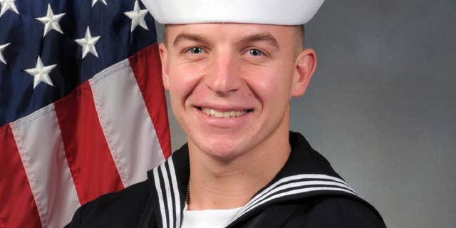 FILE - In this undated file photo released by the Naval Special Warfare Center shows Seaman James "Derek" Lovelace. Lovelace, a Navy SEAL trainee who died during his first week of basic training in Coronado, Calif. A Southern California medical examiner says Lovelace was repeatedly dunked by an instructor in his first week of basic training and has ruled his death a homicide. The San Diego County autopsy report released Wednesday, July 6, says Lovelace's cause of death is drowning with a contributing heart problem. The homicide ruling doesn't necessarily mean a crime occurred, and the instructor hasn't been charged. (Naval Special Warfare Center via AP, File)