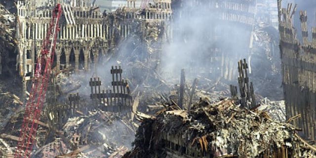 Sept. 19, 2001: Smoke rises from ground zero of the collapsed World Trade Center, more than a week after the terrorist attacks in New York.