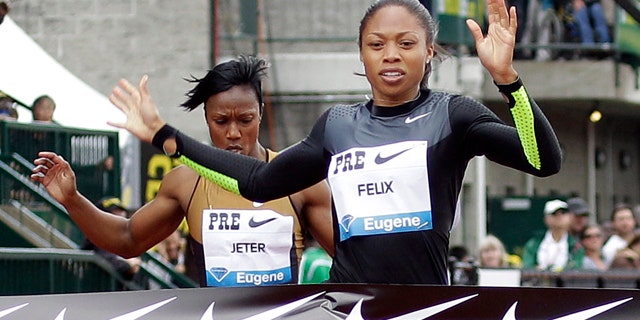 Allyson Felix will focus on the 100 and 200 meter races to maximize her chance of taking home the gold. (AP Photo)