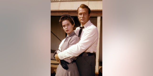 ** FILE** Darren McGavin, right, and Elizabeth Montgomery are seen in a scene from the television series "Riverboat" in this Aug. 18, 1959 file photo. McGavin, the husky, tough-talking actor who starred in the TV series "Mike Hammer," played a grouchy dad in the holiday classic "A Christmas Story" and had other strong roles in such films as "The Man with the Golden Arm" and "The Natural," died Saturday, Feb. 25, 2006. He was 83. (AP Photo)