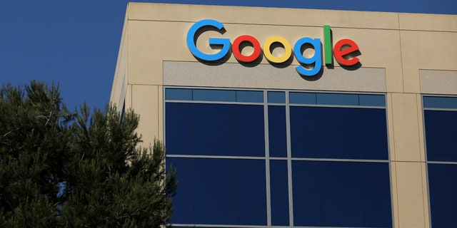Google's logo is seen on a building in Irvine, California.
