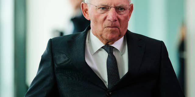 German Finance Minister Wolfgang Schaeuble arrives for the cabinet meeting at the chancellery in Berlin, Wednesday, July 6, 2016. The cabinet will decide about the German budget 2017 and the finance planing until 2020. (AP Photo/Markus Schreiber)
