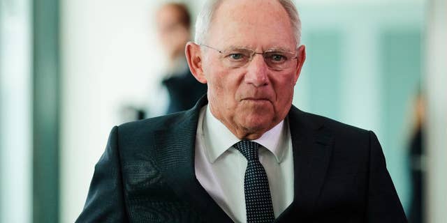 German Finance Minister Wolfgang Schaeuble arrives for the cabinet meeting at the chancellery in Berlin, Wednesday, July 6, 2016. The cabinet will decide about the German budget 2017 and the finance planing until 2020. (AP Photo/Markus Schreiber)