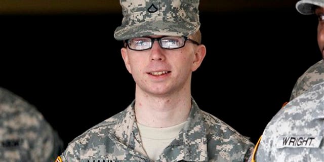 Dec. 22, 2011: Army Pfc. Bradley Manning is escorted from a courthouse in Fort Meade, Md.