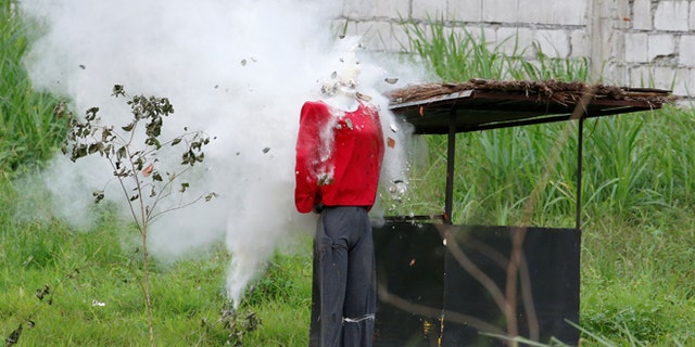 Sept. 15: A mannequin's head explodes during an assault drill by soldiers as they perform before Philippine President Rodrigo Duterte (not pictured) at the military's Scout Ranger Camp Tecson in San Miguel, Bulacan in northern Philippines