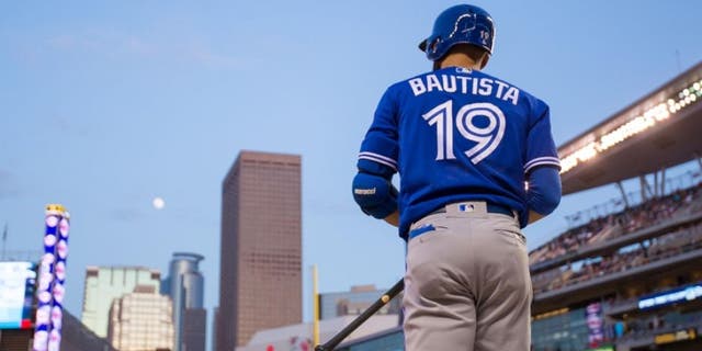 May 19, 2016; Minneapolis, MN, USA; Toronto Blue Jays outfielder Jose Bautista (19) in the on deck circle in the seventh inning against the Minnesota Twins at Target Field. Mandatory Credit: Brad Rempel-USA TODAY Sports