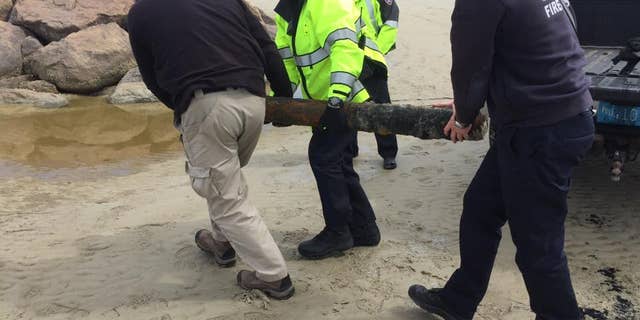 The Massachusetts State Police Bomb Squad and the Navy Explosive Ordnance Disposal were called to handle the shell.