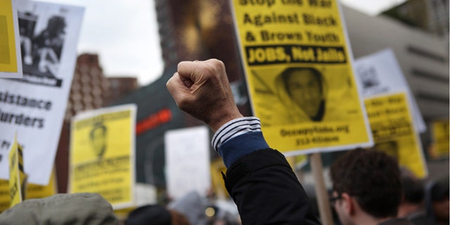 Protesters gather in support of Trayvon Martin at a 2012 demonstration in New York City.