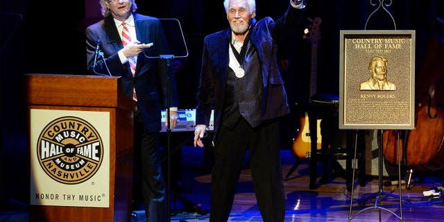 Country music star Kenny Rogers thanks the audience at the ceremony for the 2013 inductions into the Country Music Hall of Fame.