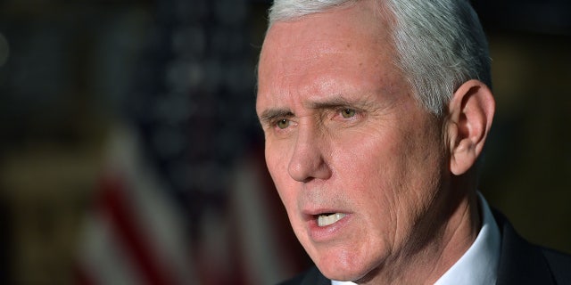 U.S. Vice President Mike Pence speaks to reporters in a hangar at Bagram Air Base in Afghanistan on Thursday, Dec. 21, 2017. (Mandel Ngan/Pool via AP)