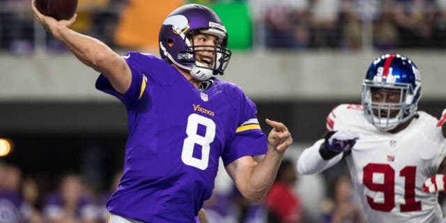 Oct 3, 2016; Minneapolis, MN, USA; Minnesota Vikings quarterback Sam Bradford (8) throws during the first quarter against the New York Giants at U.S. Bank Stadium. Mandatory Credit: Brace Hemmelgarn-USA TODAY Sports