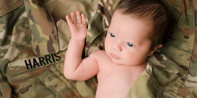 Britt cited the photo of Christian with her late father's army uniform as her favorite. "It makes me feel like he's holding her."