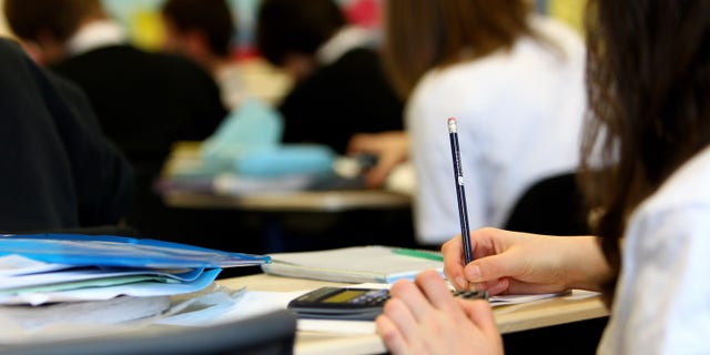 GLASGOW, UNITED KINGDOM - FEBRUARY 05: Pupils at Williamwood High School attend a math class on February 5, 2010 in Glasgow, Scotland. As the UK gears up for one of the most hotly contested general elections in recent history it is expected that that the economy, immigration, the NHS and education are likely to form the basis of many of the debates. (Photo by Jeff J Mitchell/Getty Images)