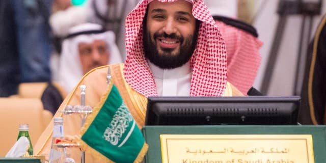 In this Thursday, April 27, 2017 photo released by Saudi Press agency, SPA, Saudi Defense Minister and Deputy Crown Prince Mohammed bin Salman reacts during the opening of the Gulf Cooperation Countries, GCC, Interior, Foreign, Defence Ministers Joint Meeting in Riyadh, Saudi Arabia. (Saudi Interior Ministry via AP)
