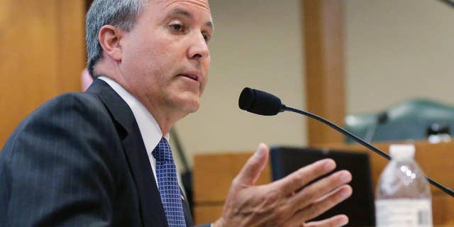 In this July 29, 2015, file photo, Texas Attorney General Ken Paxton speaks during a hearing in Austin, Texas. (AP Photo/Eric Gay, File)