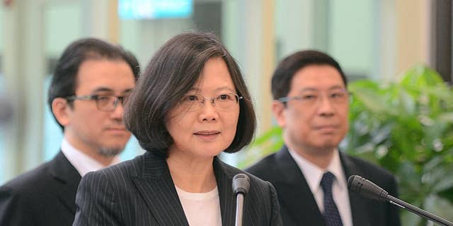 Taiwan's President Tsai Ing-wen delivers a speech before traveling to visit Central American allies including a U.S. transit, Saturday, Jan. 7, 2017, at the Taoyuan International Airport in Taouyuan, Taiwan. Tsai pledged to bolster Taiwan's presence on the international stage on her visit four Central American allies on a trip that includes U.S. transits and looks set to raise China's ire. (Central News Agency via AP)
