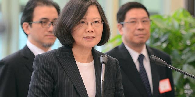 Taiwan's President Tsai Ing-wen delivers a speech before traveling to visit Central American allies including a U.S. transit, Saturday, Jan. 7, 2017, at the Taoyuan International Airport in Taouyuan, Taiwan. Tsai pledged to bolster Taiwan's presence on the international stage on her visit four Central American allies on a trip that includes U.S. transits and looks set to raise China's ire. (Central News Agency via AP)