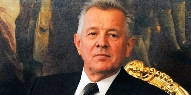 FILE - In this Oct. 20, 2011 file photo Hungarian President Pal Schmitt sits at the Hofurg Palace for talks with Austrian President Heinz Fischer, not pictured, in Vienna, Austria. A Hungarian university decided Thursday to revoke the doctorate of the country's president after an investigation found that large parts of his 1992 thesis were copied from other authors.