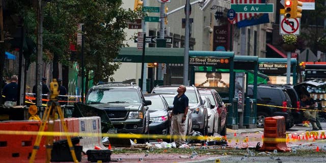 Sept. 18, 2016: Crime scene investigators work at the scene of Saturday's explosion in Manhattan's Chelsea neighborhood, in New York.