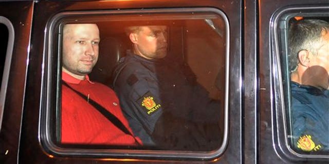 July 25, 2011: Norway's twin terror attacks suspect Anders Behring Breivik, left, sits in an armored police vehicle after leaving the courthouse following a hearing in Oslo, Norway where he pleaded not guilty to one of the deadliest modern mass killings in peacetime. (AP Photo/Aftenposten/Jon-Are Berg-Jacobsen)