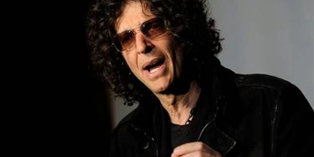 SiriusXM satellite radio talk show host Howard Stern speaks to the media about his new role as a judge on "America's Got Talent" at the Friars Club on Thursday, May 10, 2012 in New York. (AP Photo/Evan Agostini)