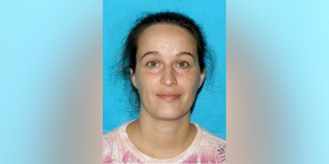 In this undated photo released by the Catoosa County (Ga.) Sheriff's Department, Catherine Goins poses for a photo. Goins, 37, of Hixson, Tenn., is charged with murder after authorities say she gunned down a northwest Georgia woman because she wanted the mother's newborn baby. (AP Photo/Catoosa County (Ga.) Sheriff's Department)