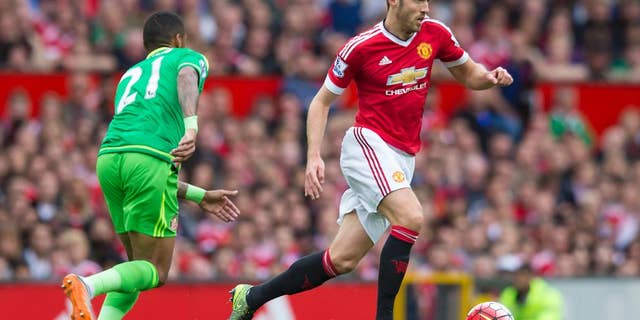 FILE - This is a Saturday, Sept. 26, 2015 file photo of Manchester United's Michael Carrick, right, as he fights for the ball against Sunderland's Yann M'Vila during the English Premier League soccer match between Manchester United and Sunderland at Old Trafford Stadium, Manchester, England. Amid the likely rotation during the 2016 busy festive program in the Premier League, there’s one player Manchester United fans won’t want to see out of the team and that player is Michael Carrick (AP Photo/Jon Super, File)