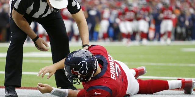 December 10, 2017: Houston Texas quarterback Tom Savage on the ground frollowing a hit during the second quarter of an NFL football game against the San Francisco 49ers.