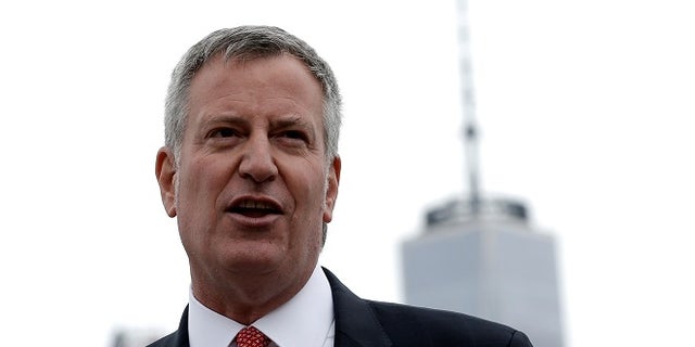 New York City Mayor Bill de Blasio speaks during a dedication ceremony for "Lunchbox", the first of eventually 20 new ferry boats of the 'NYC Ferry' service in Brooklyn, New York, U.S., April 17, 2017. REUTERS/Mike Segar - RTS12NVG