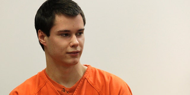 Dec. 16: Colton Harris-Moore, also known as the 'Barefoot Bandit' glances at the courtroom gallery as he walks to the defense table, in Island County Superior Court, in Coupeville, Wash.