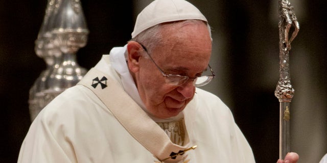 Pope Francis holds the pastoral staff as he celebrates a Mass for priests and nuns on the occasion of the feast of the presentation of the Lord, in St. Peter's Basilica at the Vatican, Monday, Feb. 2, 2015. (AP Photo/Andrew Medichini)