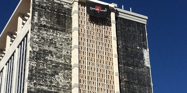 A banner with Arabic-style writing was seen hanging from a Texas building.