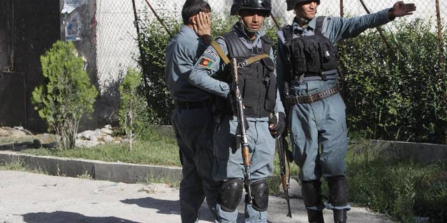 May 27, 2015: Afghanistan security forces inspect the site of attack in Kabul, Afghanistan. Afghan officials say there are "no civilian or military casualties" following an all-night siege in an upscale neighborhood in the capital Kabul. Taliban attackers targeted a guesthouse in a six-hour assault.