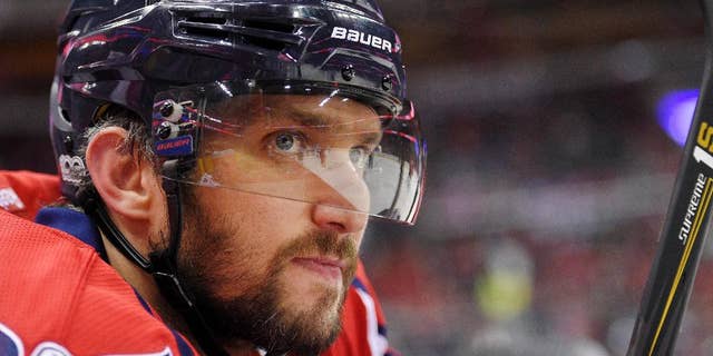In this Tuesday, March 14, 2017, file photo, Washington Capitals left wing Alex Ovechkin (8), of Russia, looks on from the bench during the first period against the Minnesota Wild in Washington.