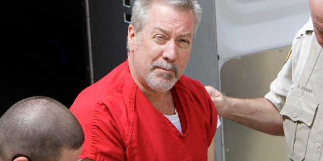 Drew Peterson, seen here in 2009, was convicted last year of killing his third wife, but that didn't stop three male pen pals from reportedly contacting the former cop. “Not only are they writing him letters, but they are putting money into his prison spending account so he can buy extra food for himself in the prison commissary like Skittles and popcorn,” a source close to Peterson told the Chicago Sun-Times last year. (AP)