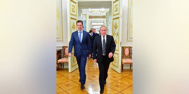 Syrian President Bashar al-Assad, left, with Russian President Vladimir Putin in the Kremlin in 2015.