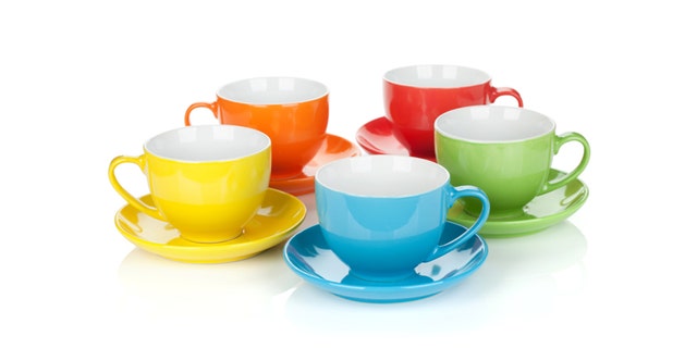 Set of colorful cups. Isolated on white background