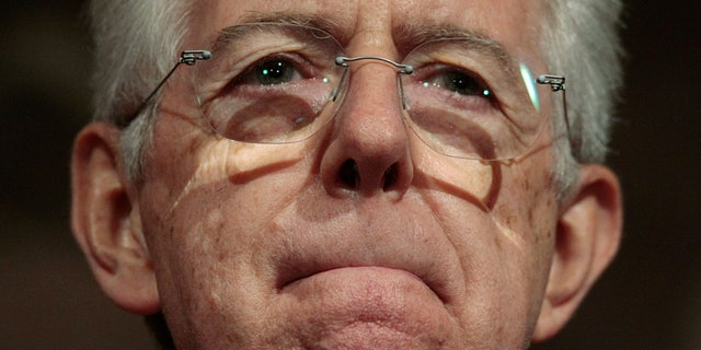 Nov. 15, 2011: Italy's premier-designate Mario Monti speaks to the media after finishing his meetings with Italian political leaders and organizations' representatives at the Senate, in Rome.