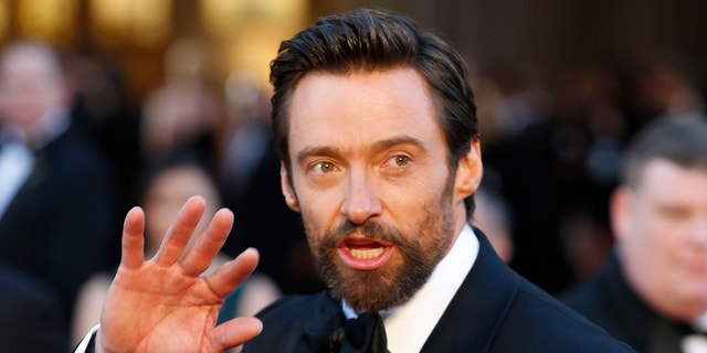Australian born actor, Hugh Jackman, best actor nominee for his role in "Les Miserables" arrive at the 85th Academy Awards in Hollywood, California on Feb. 24, 2013.