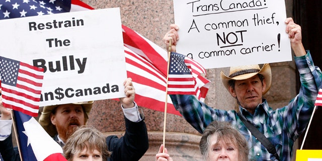 FILE: February 17, 2012: Protestors rallied in front of the Lamar County courthouse before a hearing on the Keystone pipeline in Paris, Texas.
