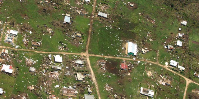 This aerial photo released by the Royal New Zealand Air Force, taken on Saturday, Jan. 11, 2014, shows the damage to Ha'apai island group, in Tonga, following Cyclone Ian. Tongan officials said about 300 to 400 families had their homes severely damaged or destroyed in the powerful storm that struck Saturday but they are relieved the death toll hasn’t risen beyond one. (AP Photo/Royal New Zealand Air Force) EDITORIAL USE ONLY