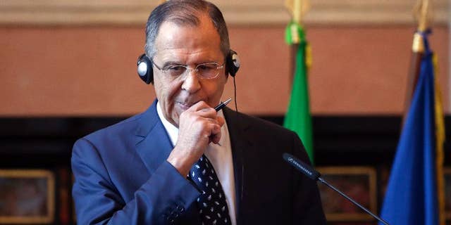 Russian Foreign Minister Sergey Lavrov meets the media during a news conference at the Mediterranean Dialogues Conference Forum, in Rome, Friday, Dec. 11, 2015. (AP Photo/Alessandra Tarantino)